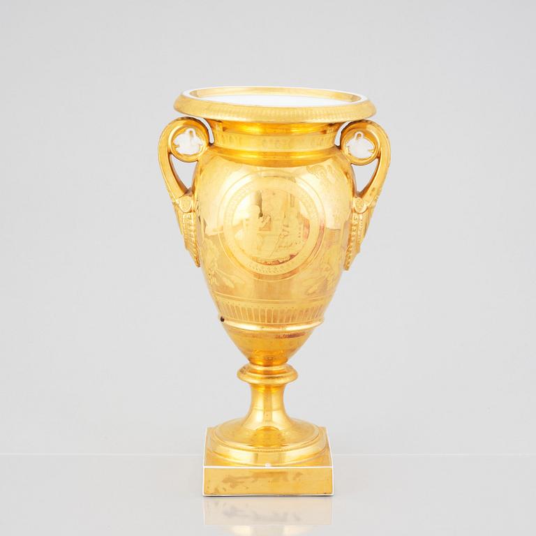 A Ludwigsburg Empire vase, signed C Goll, early 19th Century.