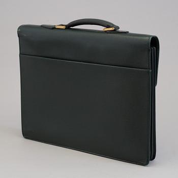 A Louis Vuitton green taiga Ambassador Briefcase.