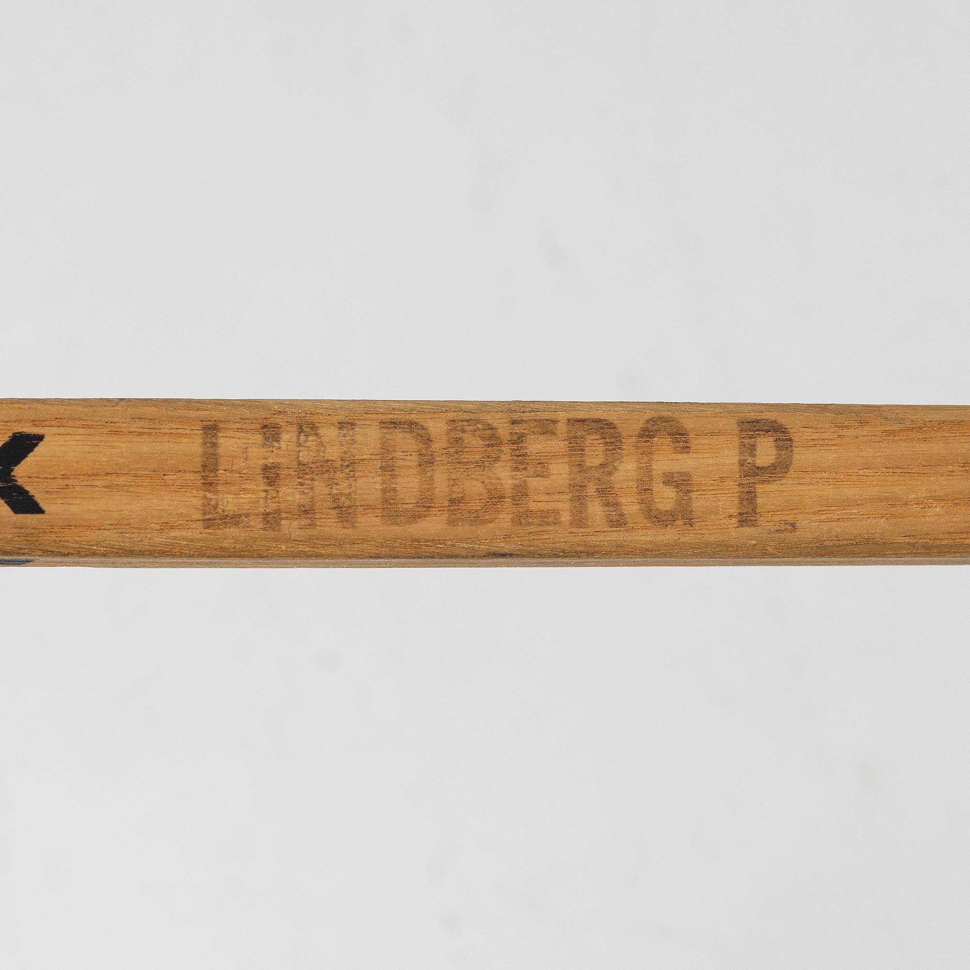 Pelle Lindberg's goaltender stick with autographs.