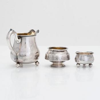 A silver cream jug and two salt cellars, Saint Petersburg, Kostroma and Moscow 1872 - 1910.