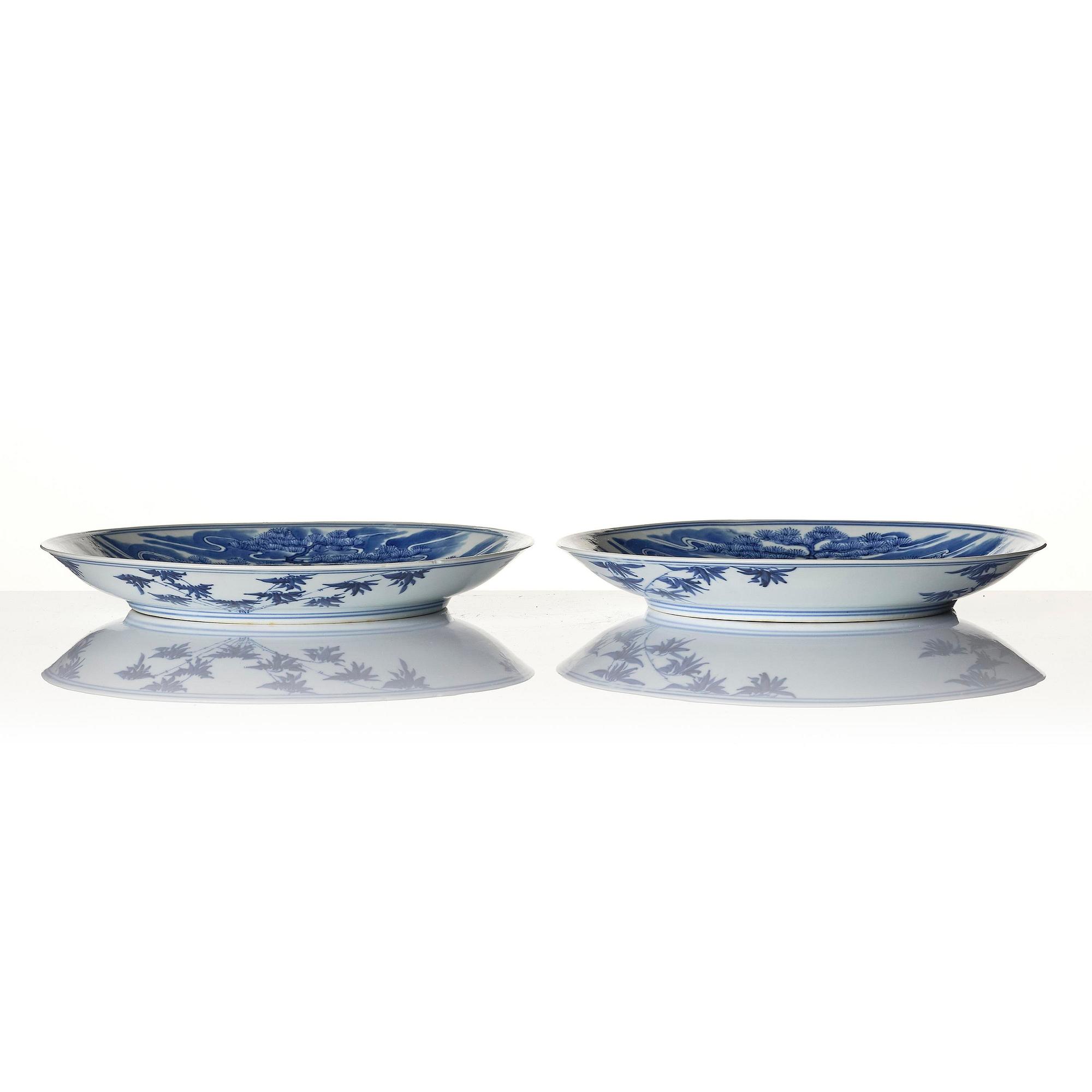 A pair of blue and white 'crane' dishes, Qing dynasty with Guangxu mark and of the period (1875-1908).
