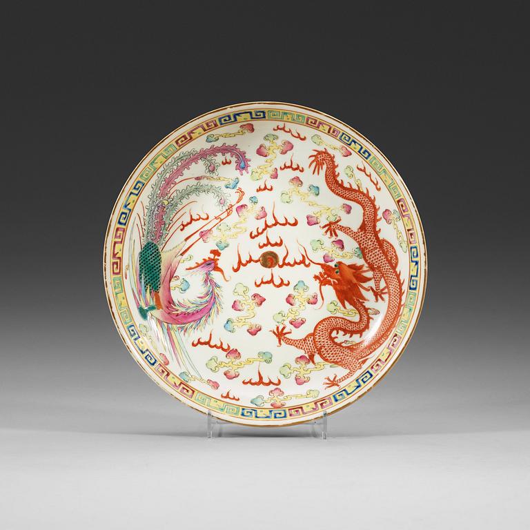 A phenix and dragon famille rose dish, Qing dynasty, with Guangxu six character mark and period (1875-1908).