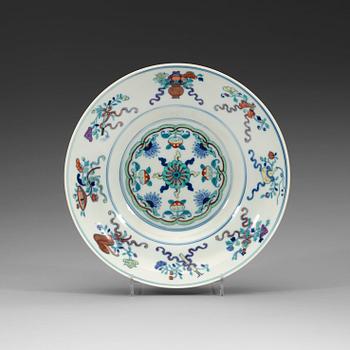 A doucai dish, Qing dynasty, with Tongzhis six character mark and period (1862-74).