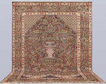 A Kerman Laver carpet, so-called Millefleur, approx. 392 x 300 cm.