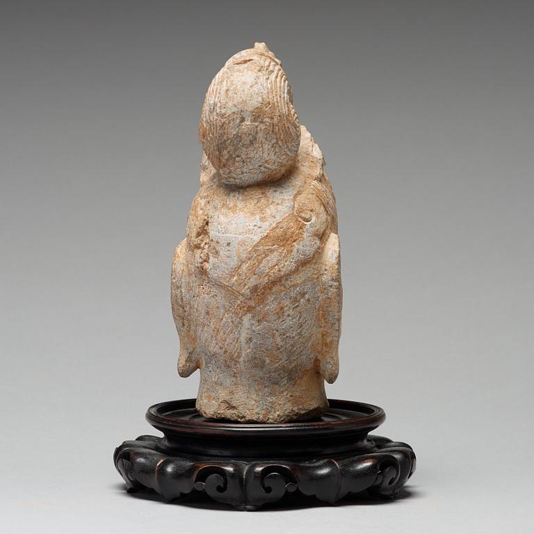 A stone sculpture of Guanyin, presumably Ming dynasty, 17th Century.