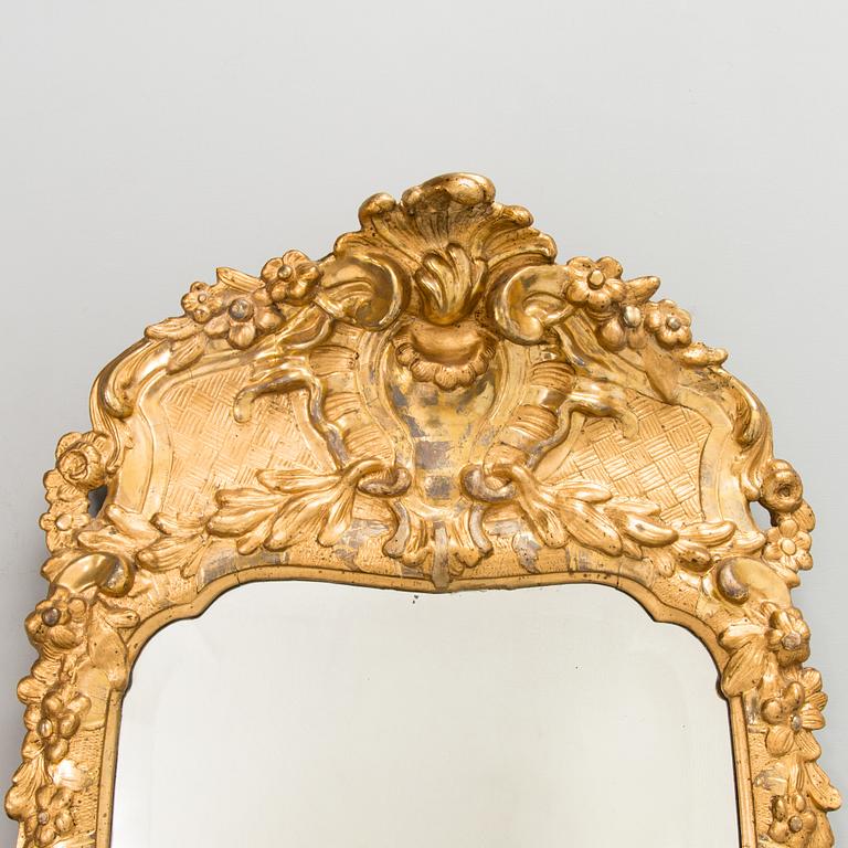 A late 18th century Swedish Rococo mirror.