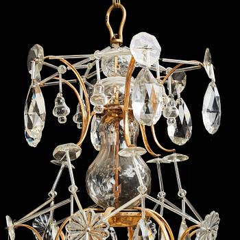 A pair of Swedish Rococo 18th century six-light chandeliers by Olof Westerberg dated 1789 and 1790.