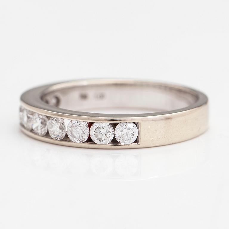 An 18K gold eternity ring with brilliant cut diamonds 1.0 ct in total according to engraving.