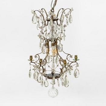A Rococo style chandelier, early 20th Century.
