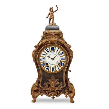 An 18th century mantel clock, probably Suisse.