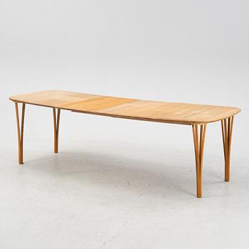 A 'Timeless' oak dining table, Haslev Møbelsnedkeri, Denmark.