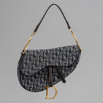 CHRISTIAN DIOR, a vintage mpnpgram canvas 'Saddle Bag!.