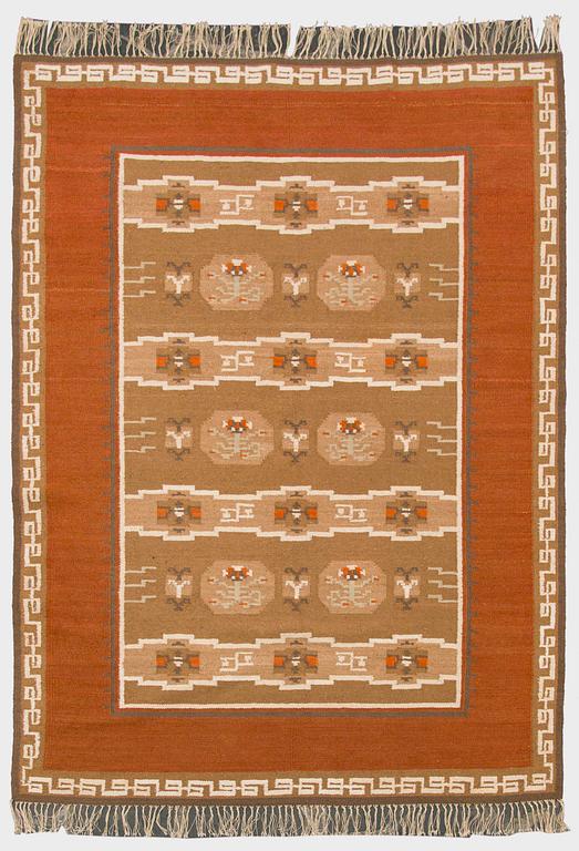 A finnish flat weave carpet 'What shall I do?', manufacturer Laura Korpikaivo-Tamminen. Circa 350 x 260 cm.