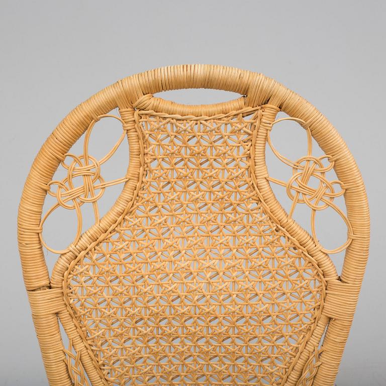 A pair of second half of the 20th cnetury rattan chairs.