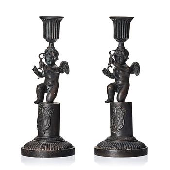 110. A pair of German (Berliner Eisen) Empire iron candle sticks.