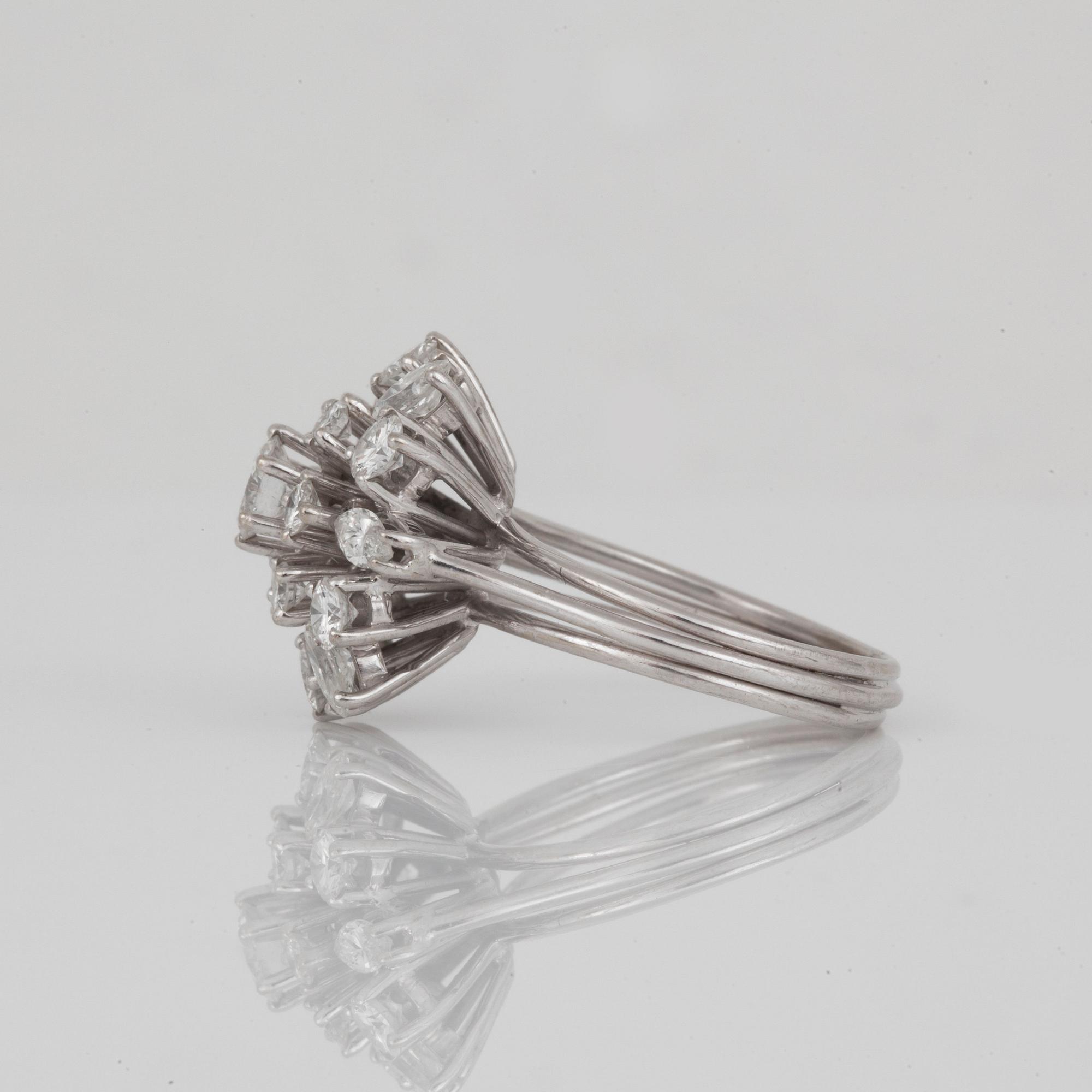 A circa 1.95 ct marquise- and brilliant-cut diamond ring.