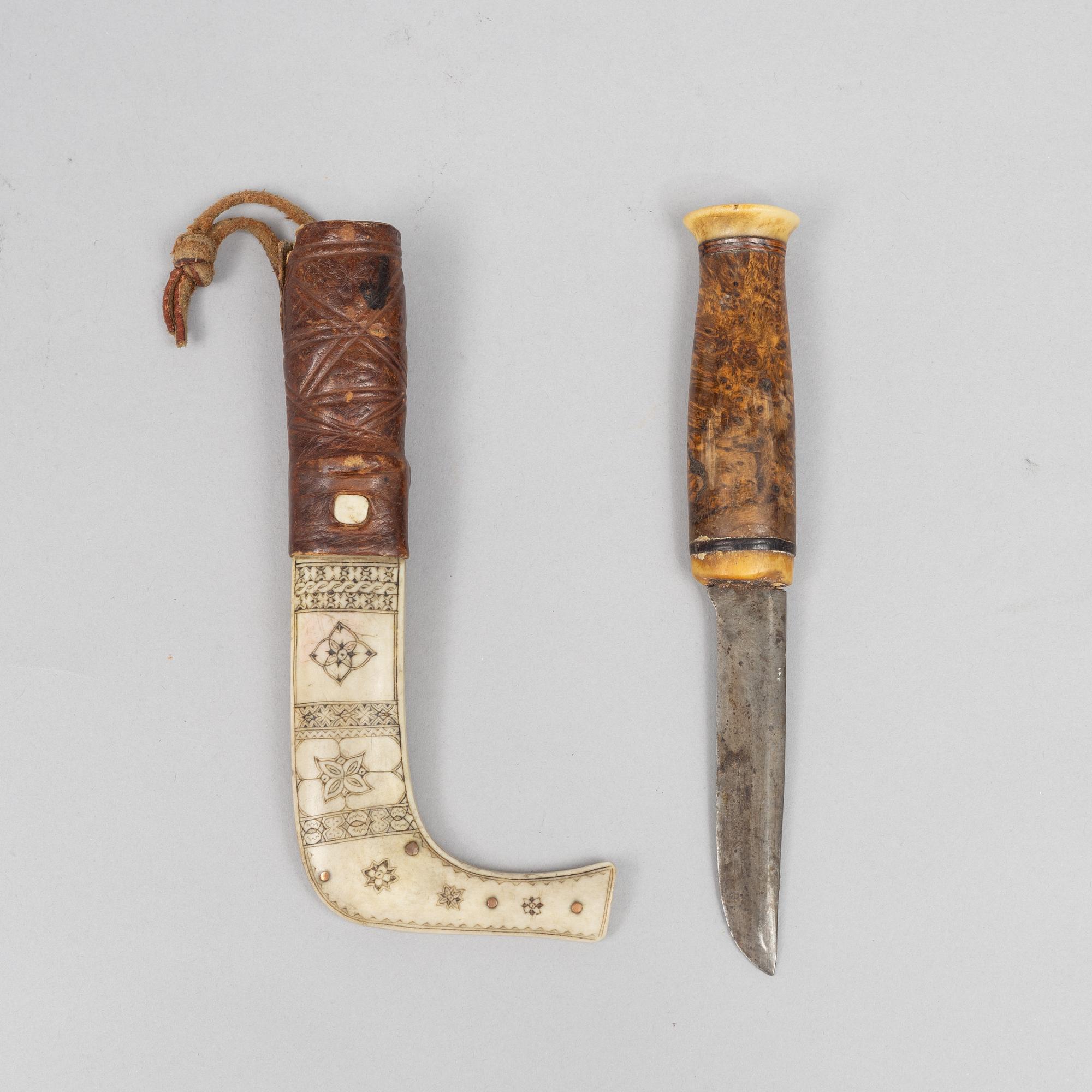 Per Erik Svonni, a reindeer horn knife, signed and dated 1928.