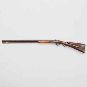 a 18th century rifle later made in to a percussion rifle signed by Lars Rånge, Jönköping.