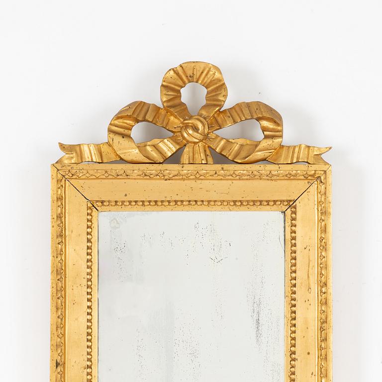 A Gustavian style mirror, first half of the 20th Century.