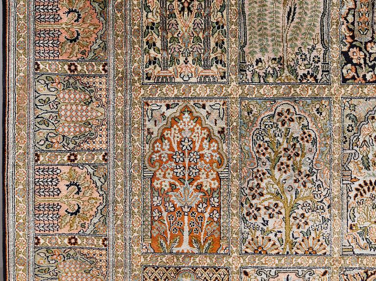 A silk Kashmir carpet, 295 x 178 cm.