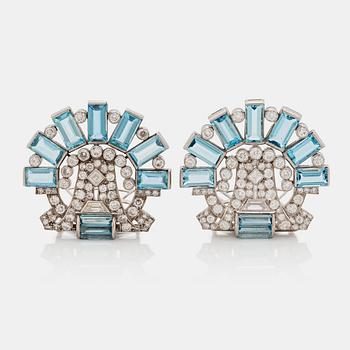 A circa 1940's aquamarine and diamond double clip signed Cartier, London.