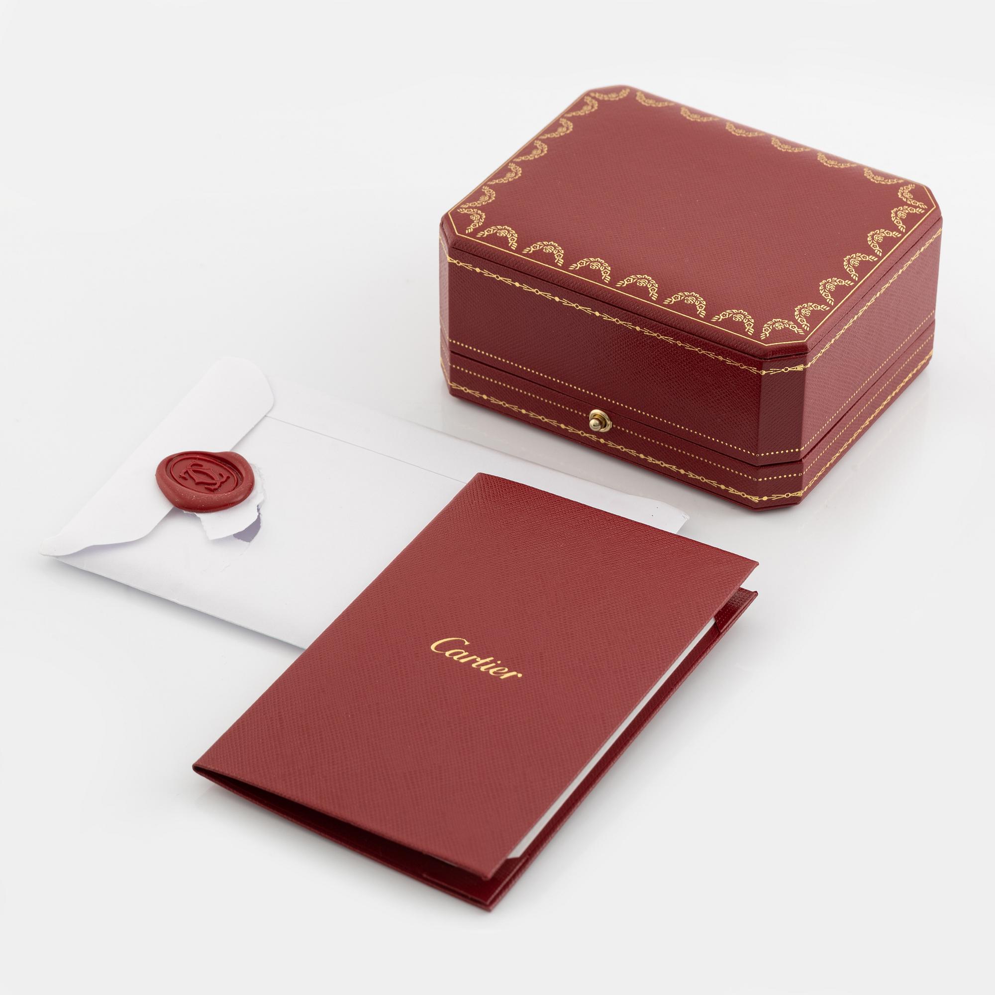 A Cartier "Trinity" bracelet, 18K three colour gold and textile.