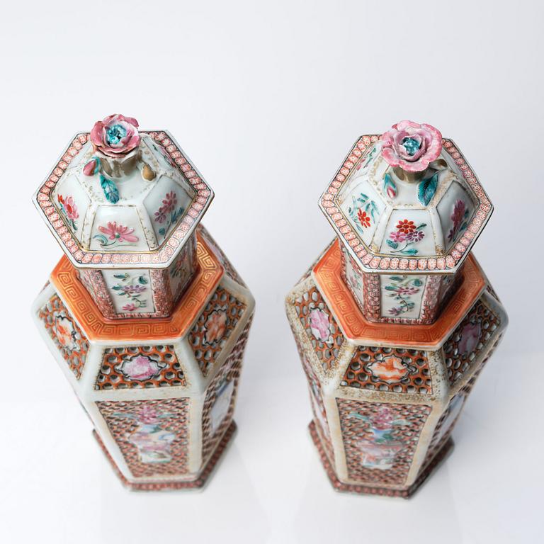 A pair of famille rose vases with covers, Qing dynasty, Qianlong (1736-95).