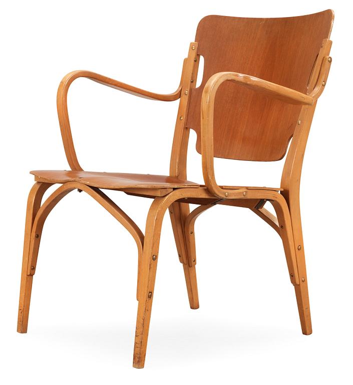 A Carl-Axel Acking mahogany and beech armchair, Svenska Möbelfabrikerna, Bodafors, Sweden 1940's.