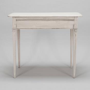 A Gustavian table, early 19th century.