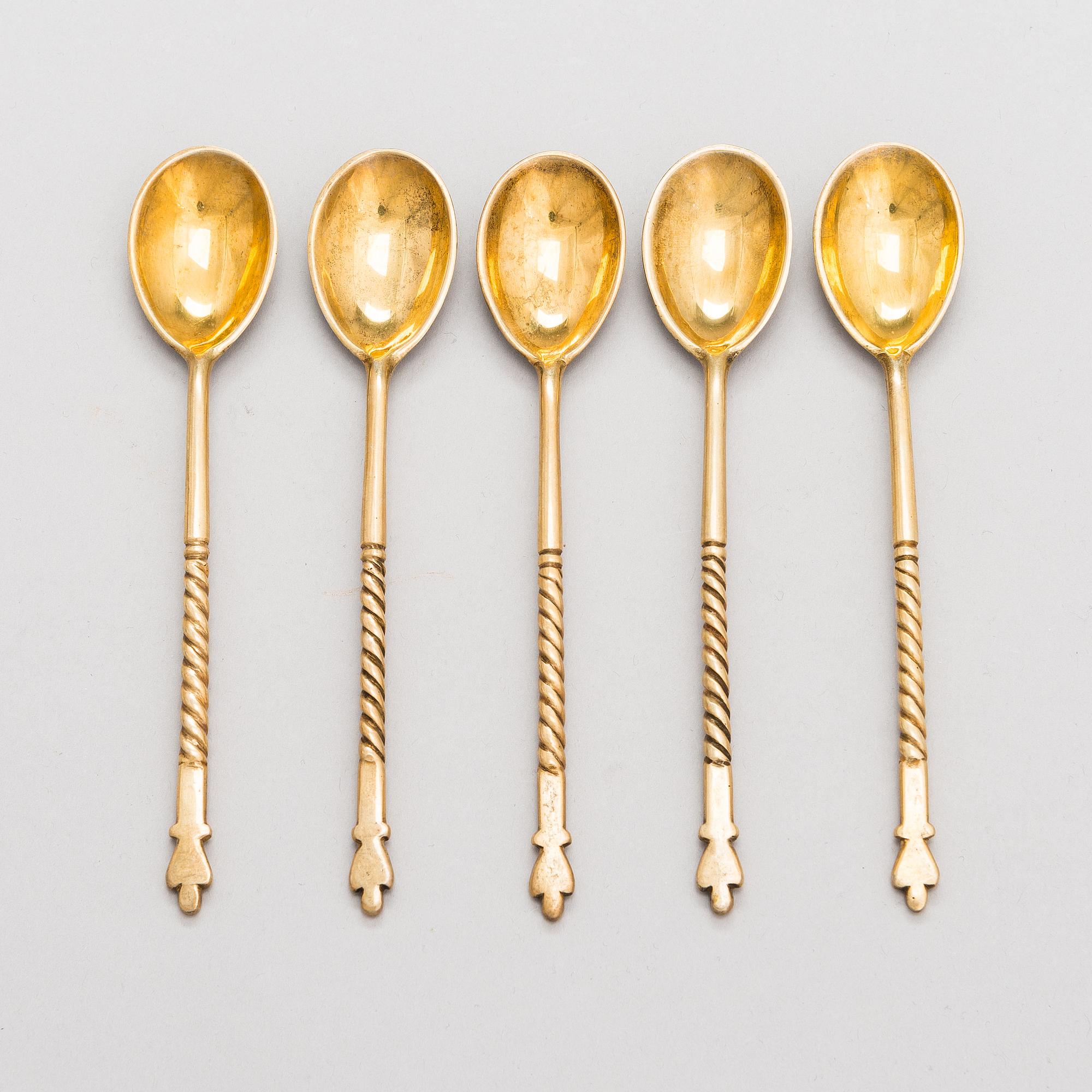 A set of eight Kubachi tea glass holders and five teaspoons, parcel-gilt silver, niello, Russia 1960s.