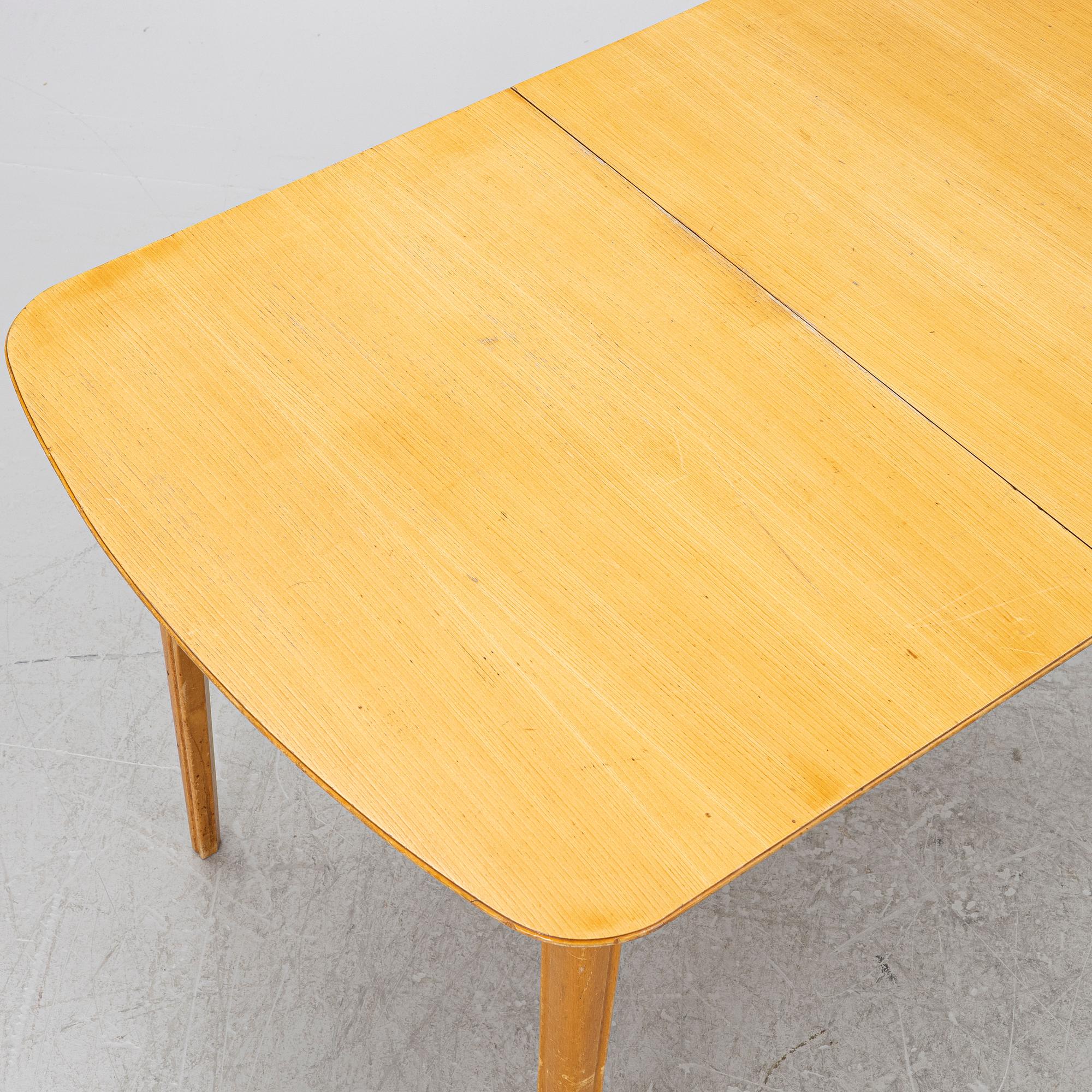 A dining table with six chairs, Sweden, 1940's.