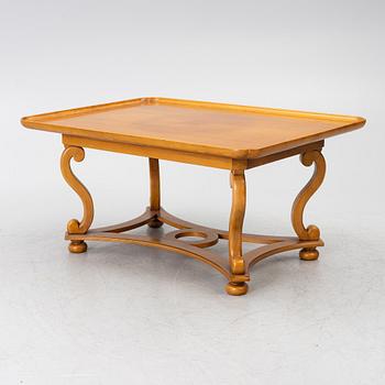 Coffee table, 20th century, with linked legs.