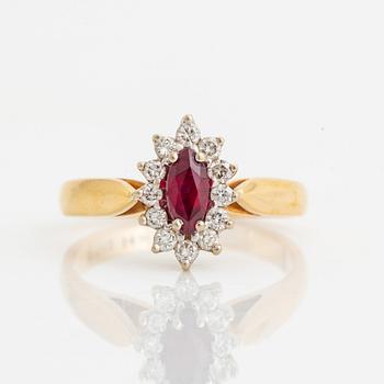 Navette cut ruby and brilliant cut diamond ring.