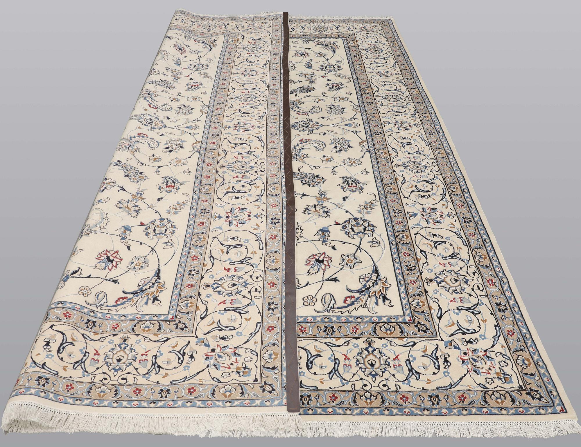 A carpet, Nain Part Silk, S.K 9 LAA, 340 x 250 cm.