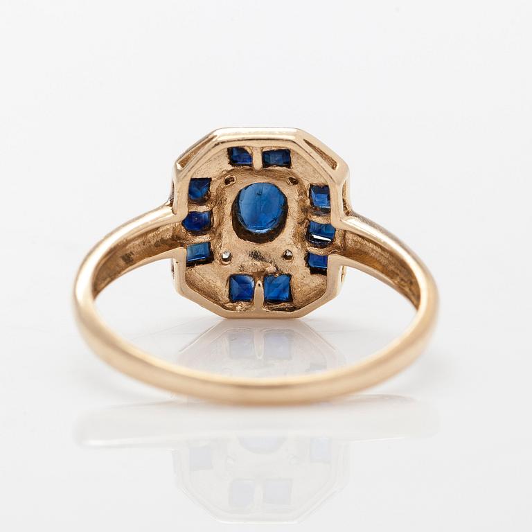 A 14K gold ring with sapphires and eight-cut diamonds. Finnish import marks 1994.