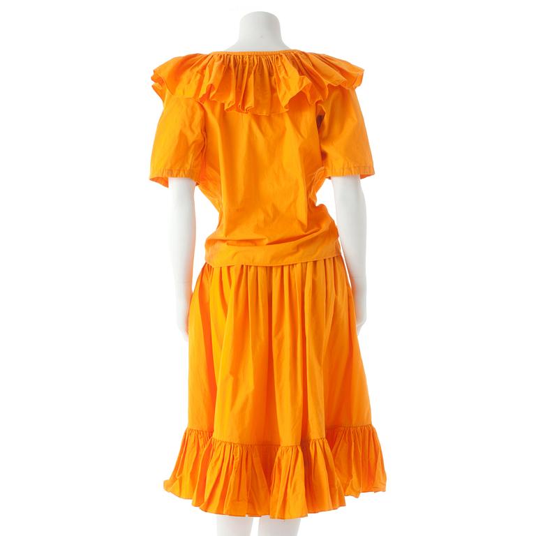 YVES SAINT LAURENT, a orange cotton top and skirt from the 80s.