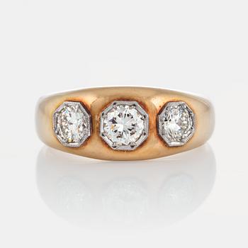 962. A ring set with three round brilliant-cut diamonds with a total weight of ca 1.20 cts.