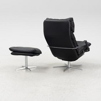 A leather 'SL 330' swivel chair and ottoman, Søren Lund, Denmark.