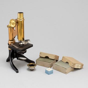 A microscope, marked Ernst Leitz, Wetzlar, No 85125.