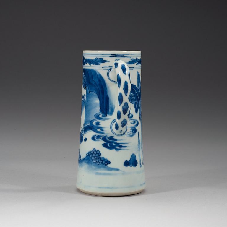 A blue and white Transitional tankard, 17th century.