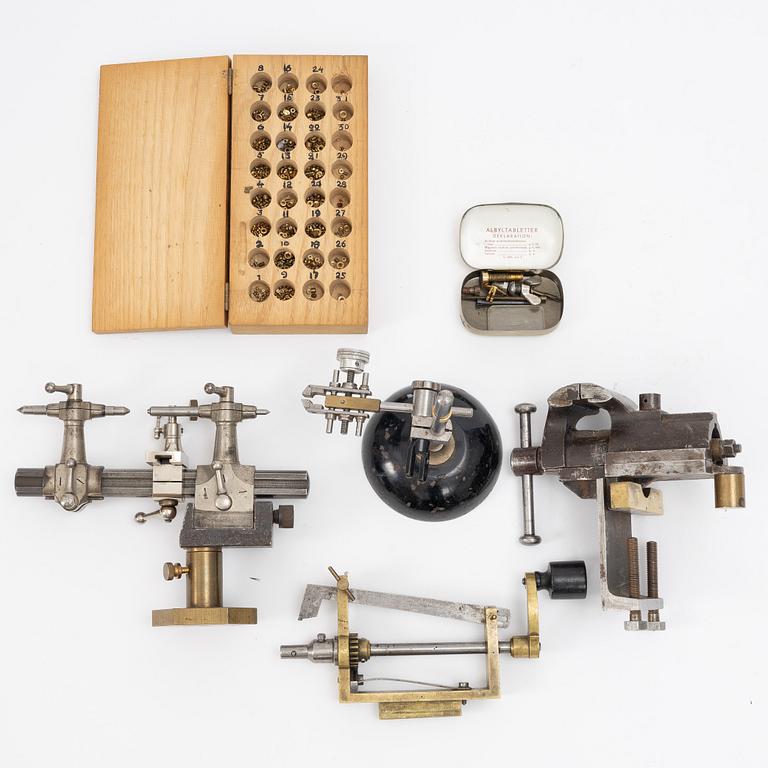 Watchmaking tools and spare parts, including a lathe by Lorch.