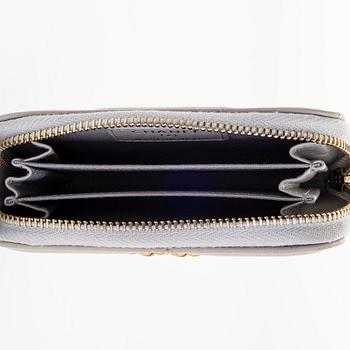 Chanel, A "19 O-coin purse" wallet.