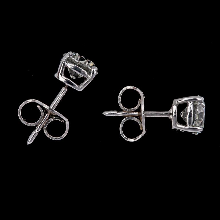 A pair of brilliant cut diamond ear studs, each 0.70 cts.