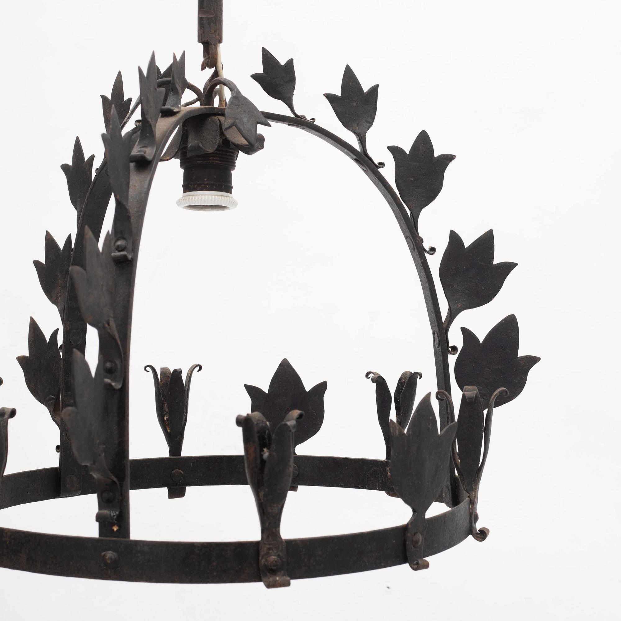 A wrought iron chandelier, first half of the 20th century.