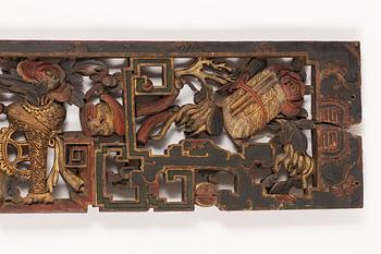 A Chinese carved wood panel, 19th Century.