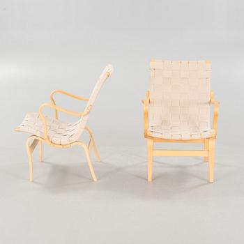 BRUNO MATHSSON, a pair of lounge chairs, model "Eva", late 20th century.