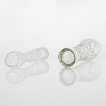 Tapio Wirkkala, four line-cut clear glass vases, signed Tapio Wirkkala Iittala.