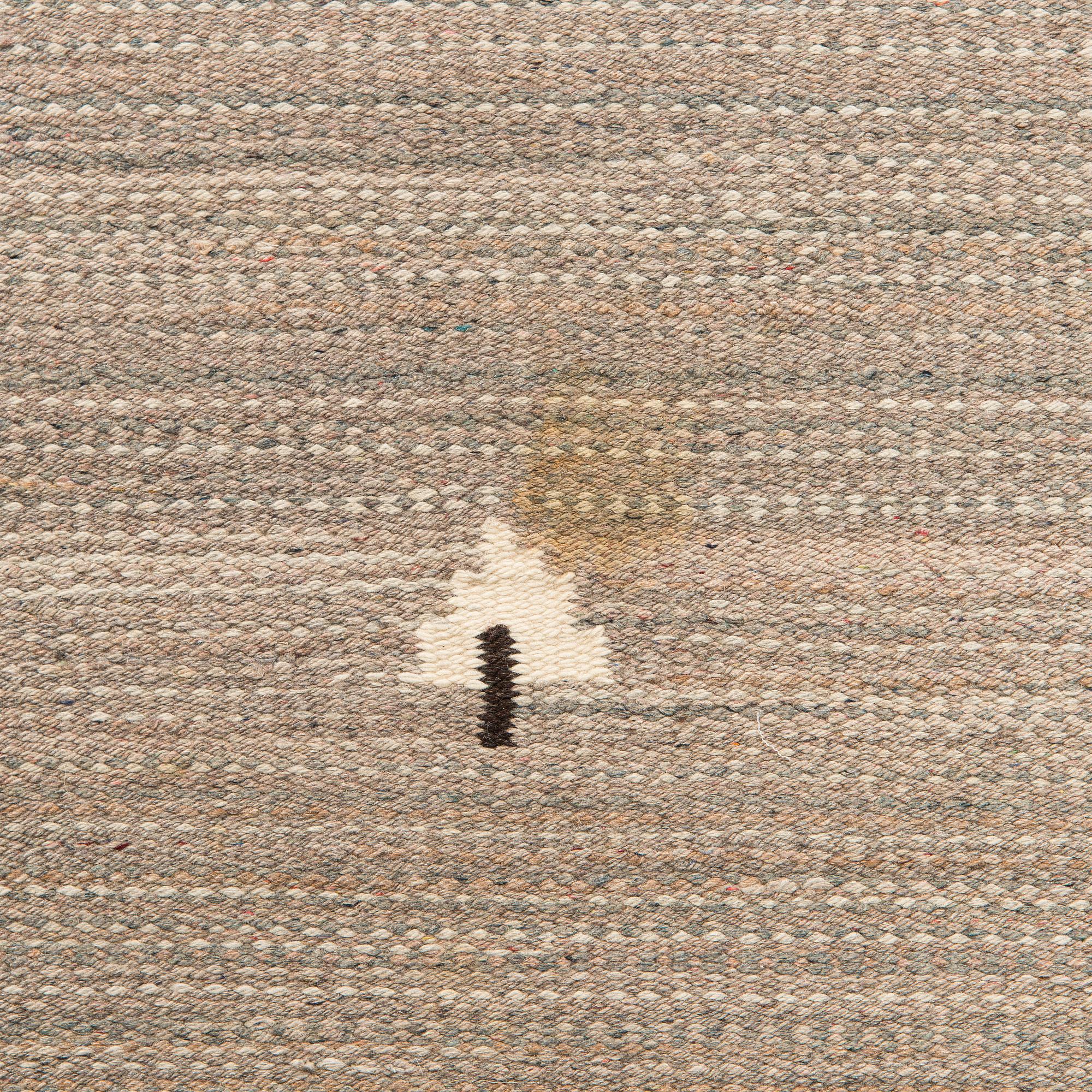 A 1930's Finnish flat weave carpet. Circa 245 x 180 cm.