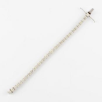 Tennis bracelet, 18K white gold with brilliant-cut diamonds.
