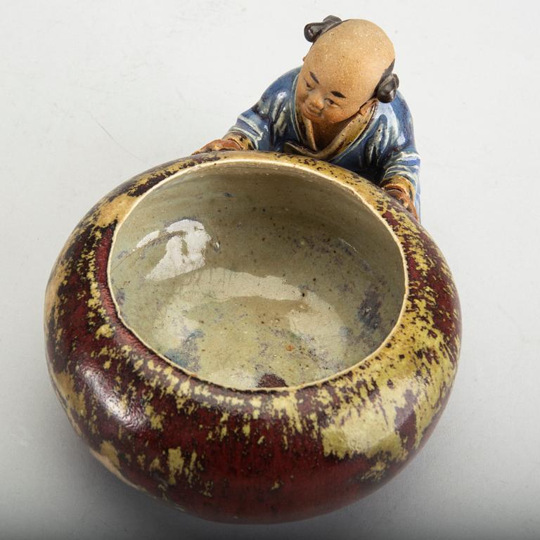 A Japanese 20th century signed porcelain figurine.